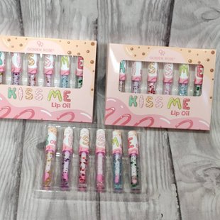 Блеск для губ с блестками Qoiden Rose Kiss Me Lip Oil