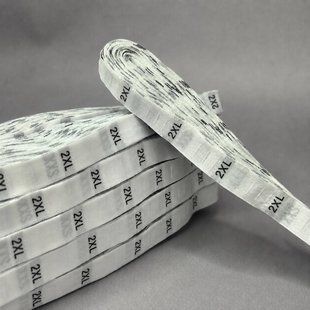 Жаккардовые размерники для одежды 1,2 см (моток 500 шт) - 2XL белый