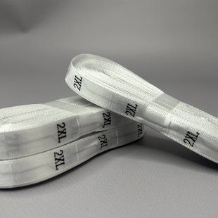 Сатиновый размерник для одежды 1,2 см (моток 500 шт) - 2XL белый